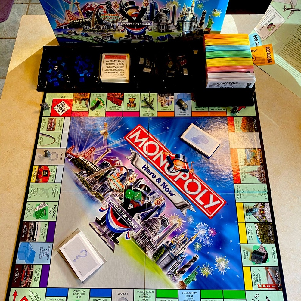 Monopoly Here & Now Edition! All pieces included. Years 8+ Great family game!